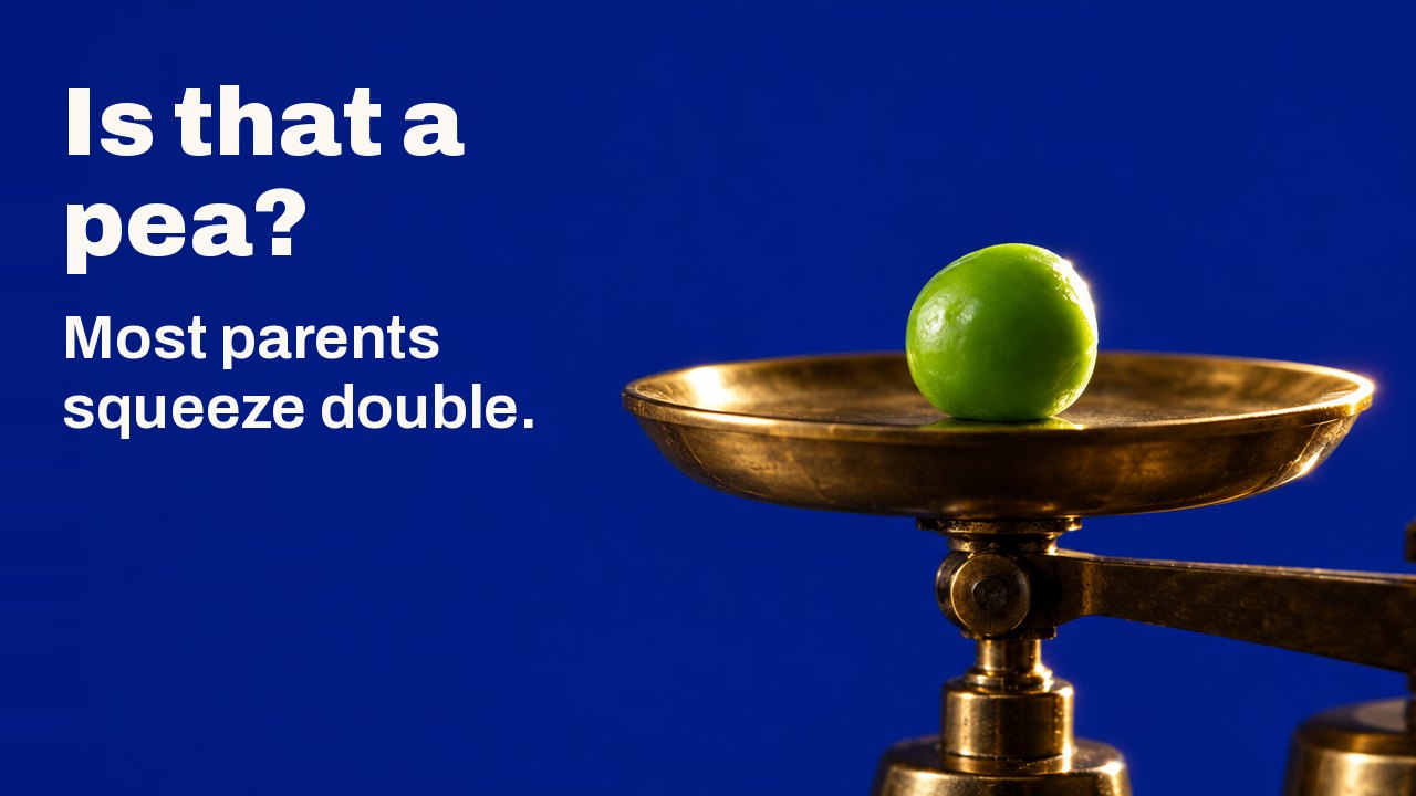 Is that a pea? Most parents squeeze double. Seen from straight above under one hard light: a single glossy green pea lies on the round brass pan of a small laboratory balance against a deep teal ground.