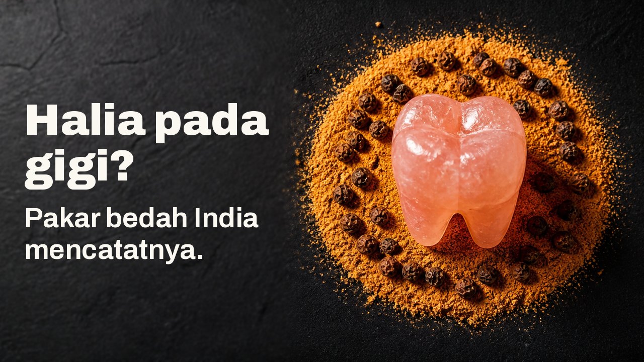 Halia pada gigi? Pakar bedah India mencatatnya. Dilihat dari atas di atas kain nila gelap: gigi geraham yang diukir daripada garam batu merah jambu berdiri dalam bulatan halia kering kisar berwarna jingga dan lada hitam.