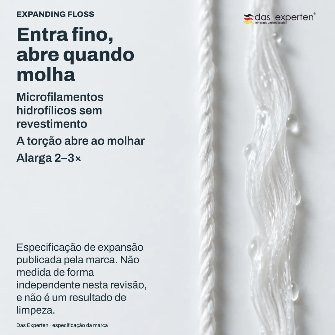 Estudo de material: um feixe de filamentos finos, seco e apertado de um lado, molhado e aberto do outro, em fundo liso
